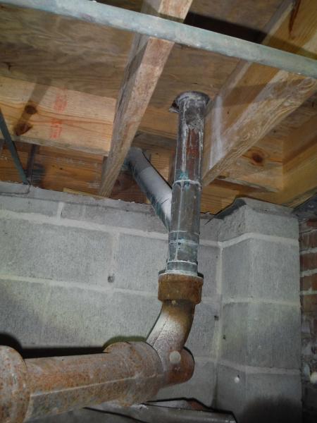 shows how copper and cast iron plumbing was used in 1960